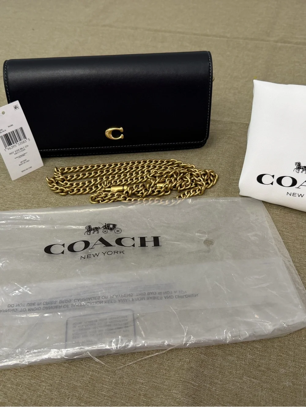 Coach sleek black